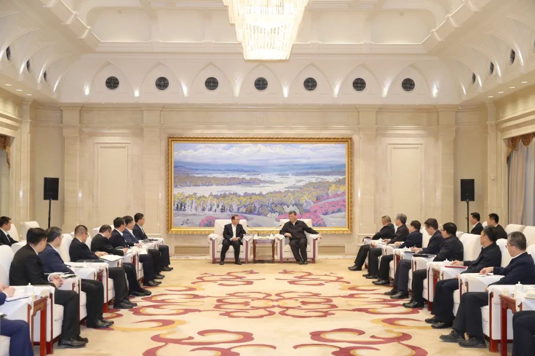 華電集團黨組書記、董事長江毅拜會新疆維吾爾自治區主要領導